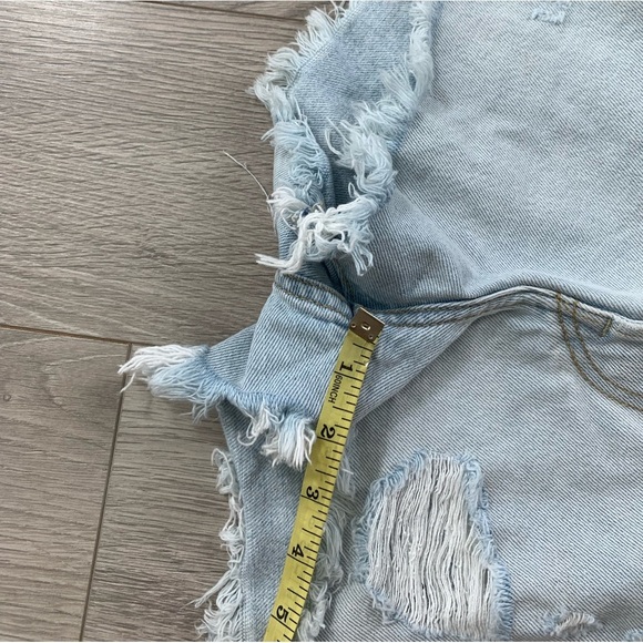 Levi’s Light Wash Distressed Raw Hem Button Fly Jean Shorts - Picture 11 of 11